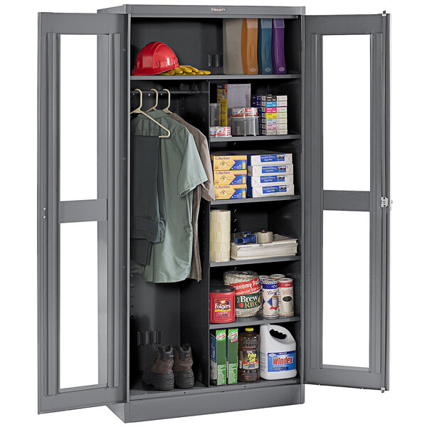 A dark gray Tennsco metal combination cabinet with open doors.