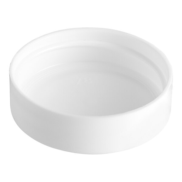 A white plastic container lid.