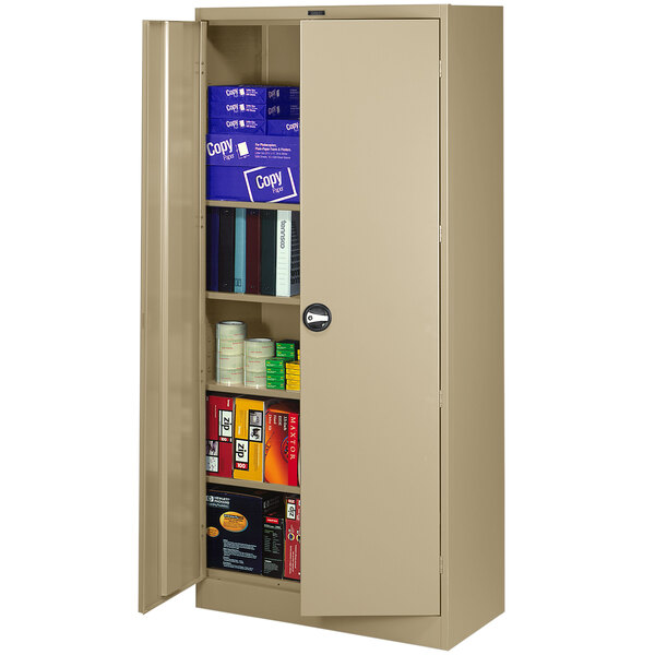 A tan metal Tennsco storage cabinet with solid doors open to reveal books and cans.