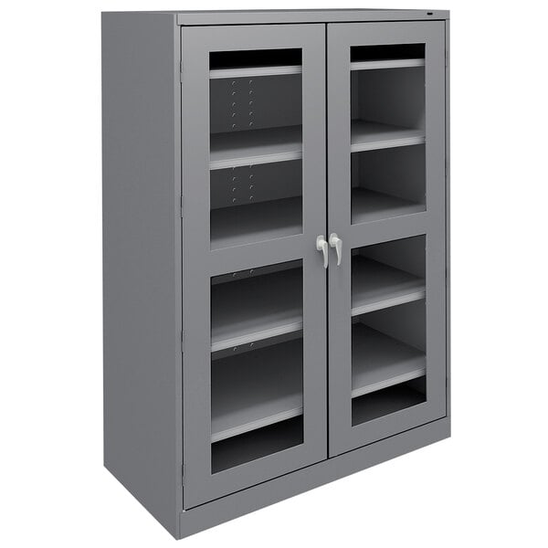 A dark gray Tennsco metal storage cabinet with C-Thru doors.