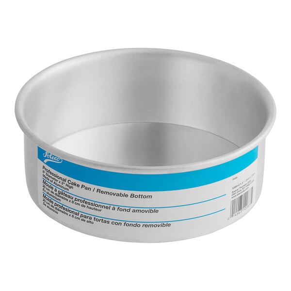 A round silver Ateco cake pan with a blue and white label.