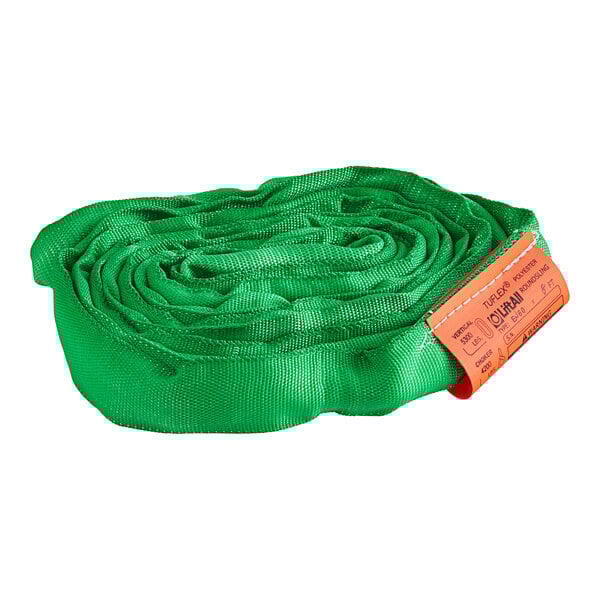 A green mesh roll with an orange and white tag containing a green Lift-All Tuflex roundsling.