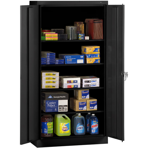 A black metal Tennsco storage cabinet with shelves full of items.