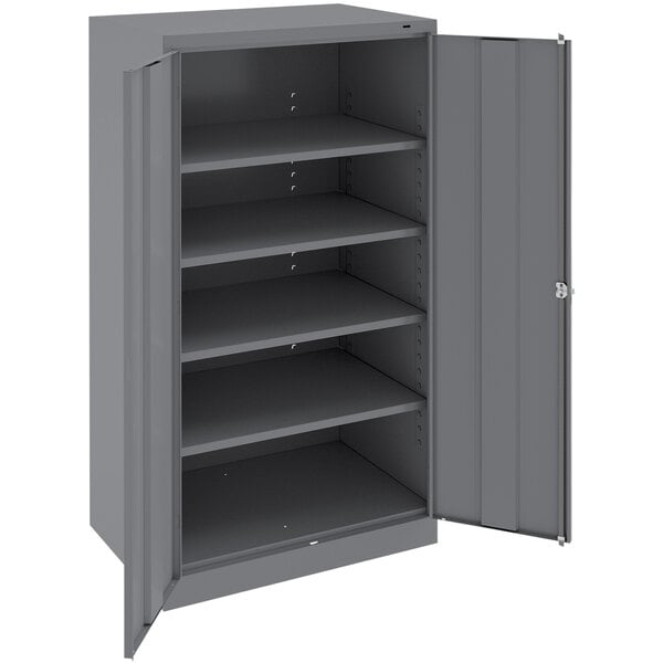 A grey metal Tennsco storage cabinet with solid doors open.