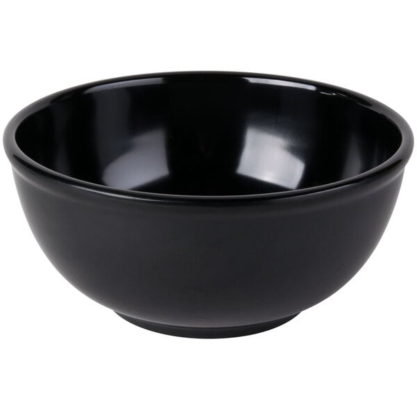 A black Cal-Mil round melamine bowl.