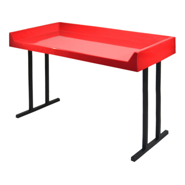A red rectangular table with black legs.
