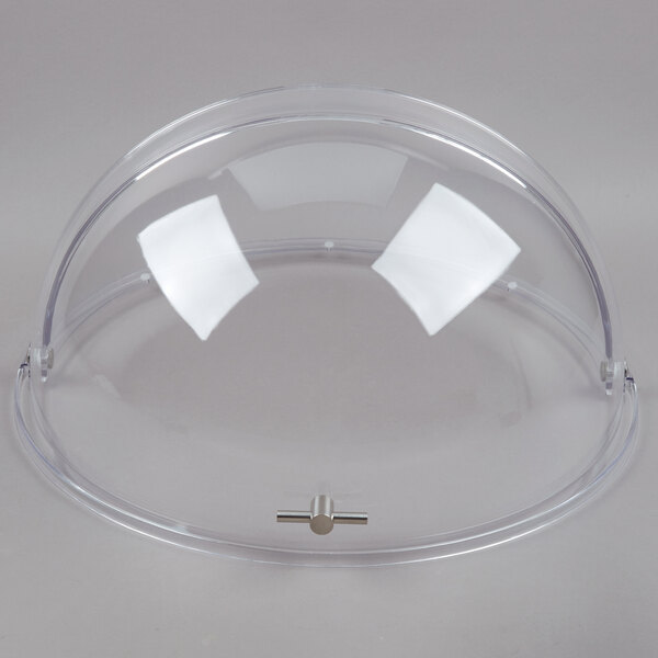 A clear plastic dome with a silver handle.