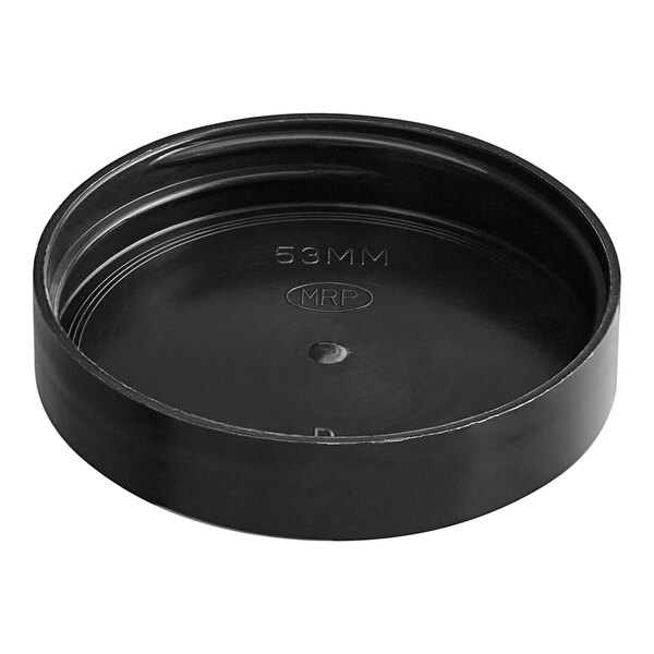 A black plastic cap with a hole in it.