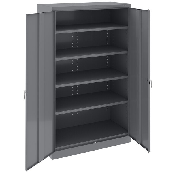 A dark gray metal Tennsco storage cabinet with shelves and solid doors.