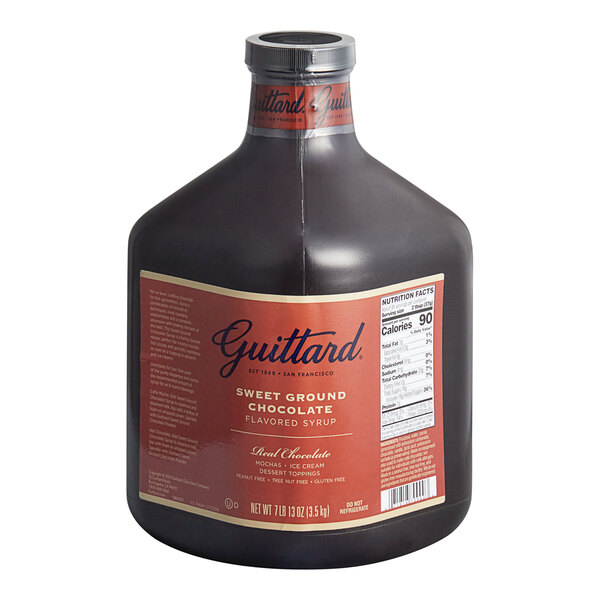 A case of Guittard Sweet Ground Dark Chocolate Flavoring Sauce bottles on a white background.
