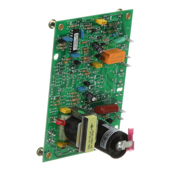 A green circuit board with many small electronic components.