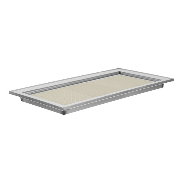 A rectangular metal tray with a white rectangular ceramic object in the center.