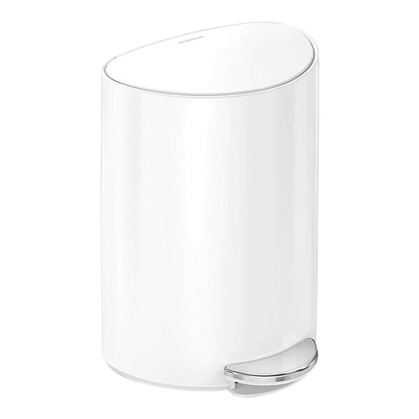 A white simplehuman semi-round step-on trash can with a silver lid.