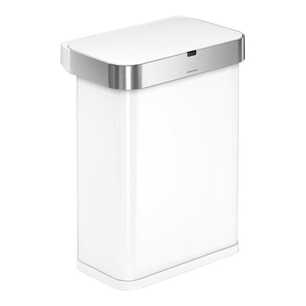 A white simplehuman rectangular sensor trash can with a silver lid.