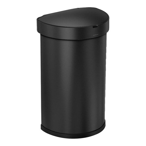 A simplehuman matte black stainless steel semi-round sensor trash can with a lid.