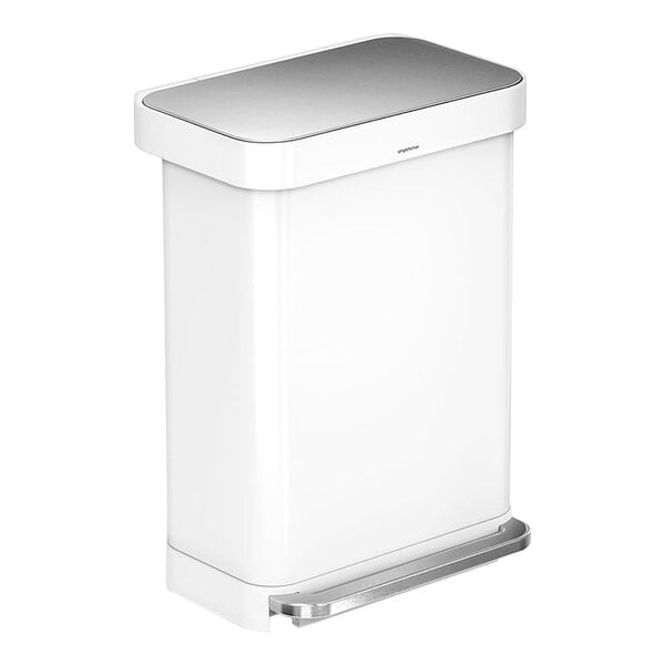 A white simplehuman rectangular step-on trash can with a silver lid.