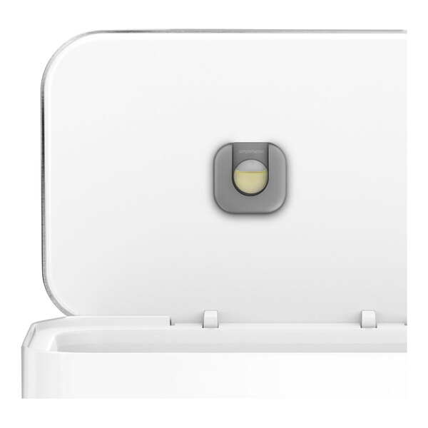 A white simplehuman rectangular step-on trash can with a liner pocket.