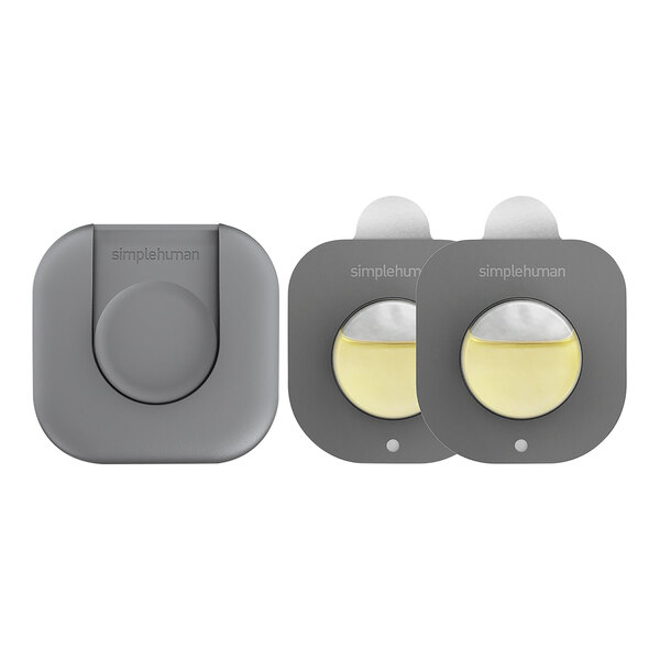 A grey square simplehuman container with yellow round discs inside.