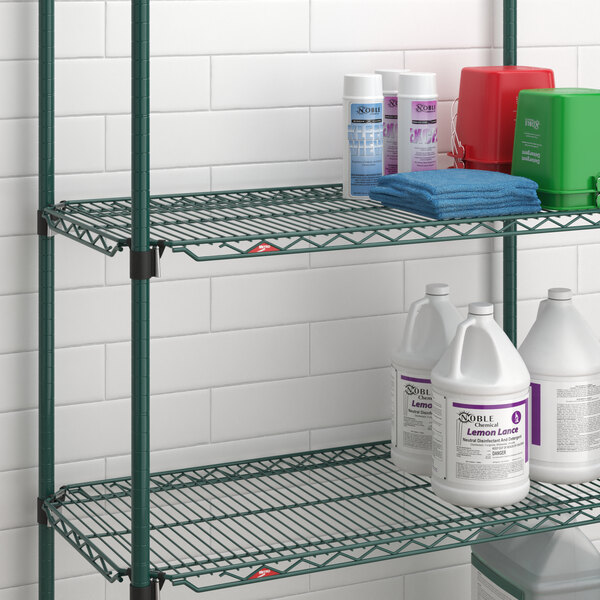 Metro Super Erecta wire shelf with cleaning supplies on it.