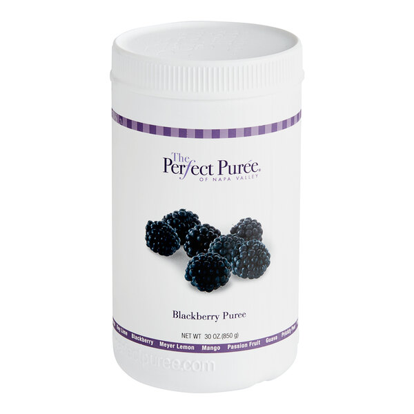A white container of Perfect Puree Blackberry Puree with a white label with blackberries on it.