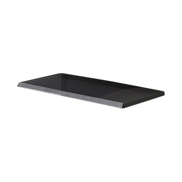 A black rectangular Borray metal shelf on a counter.