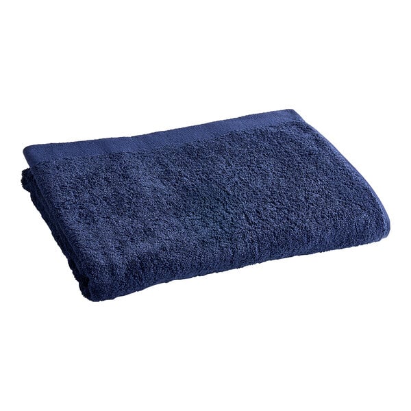An Oxford navy blue pool towel on a white background.
