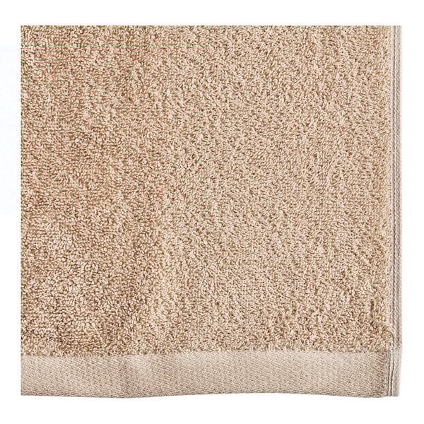 An Oxford taupe pool towel.