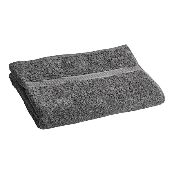A folded grey Oxford Imperiale pool towel on a white background.
