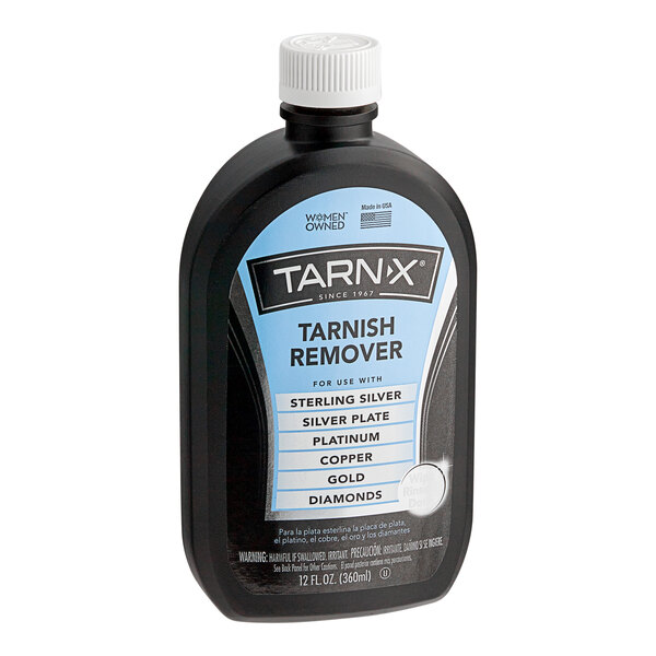 A black Tarn-X bottle with a blue label for tarnish remover.