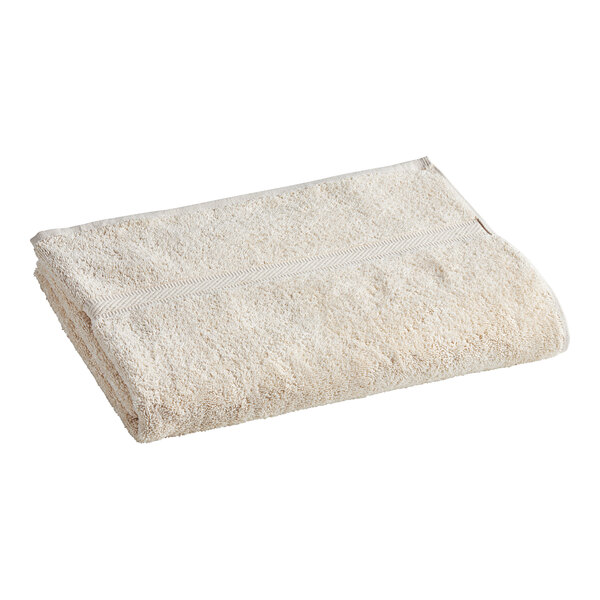 A folded white Oxford Imperiale pool towel on a white background.