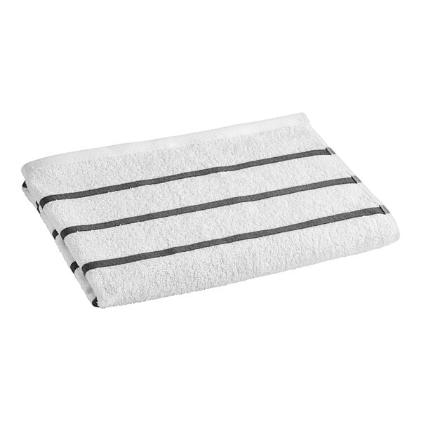 An Oxford pool towel with charcoal gray stripes.