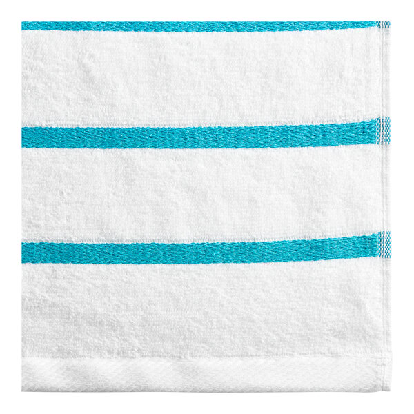 An aqua towel with white stripes.