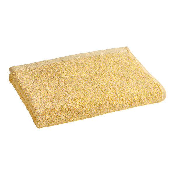 A sunrise yellow Oxford pool towel on a white background.