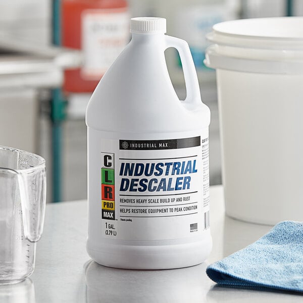 A white bottle of CLR Pro Max Industrial Descaler with a black label.