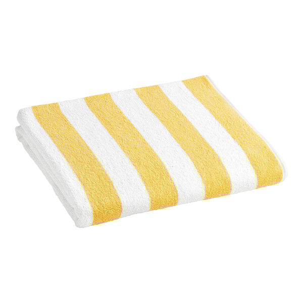 An Oxford Playa yellow and white striped pool towel.
