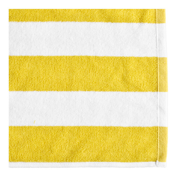 A close-up of a yellow and white striped fabric.