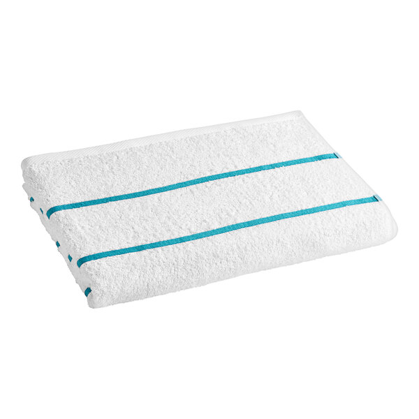 A white Oxford pool towel with blue stripes.