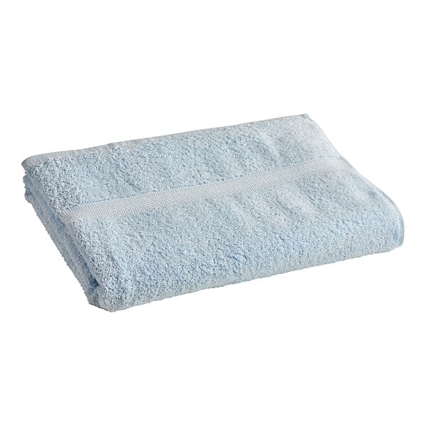 A folded blue Oxford Imperiale pool towel.