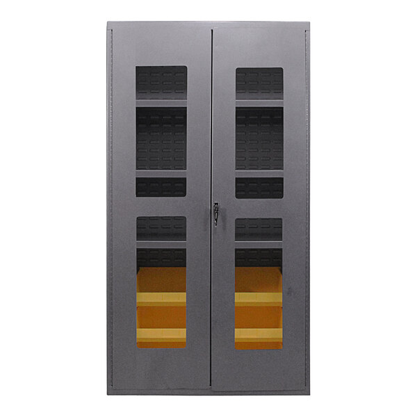 A grey steel Valley Craft storage cabinet with glass doors on two shelves with six yellow bins inside.