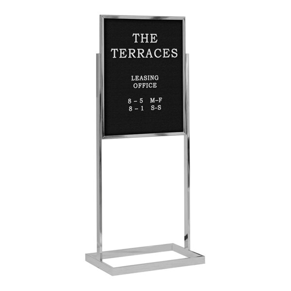 A United Visual Products black double-sided pedestal letterboard with white text on a white background.