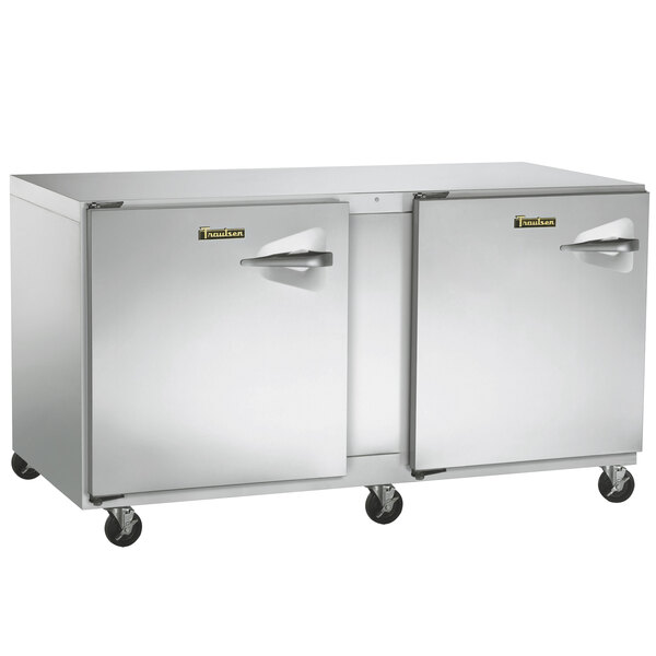 A Traulsen undercounter refrigerator on wheels.