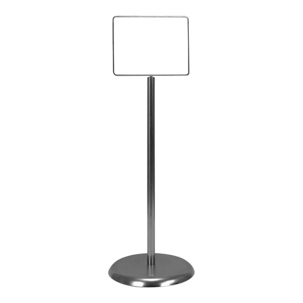 A chrome metal pedestal sign holder with a white rectangular sign in it.