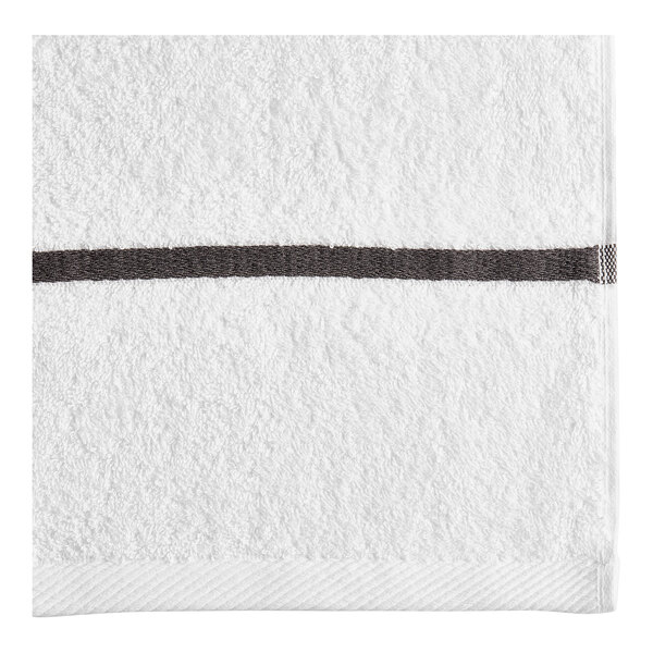 A white pool towel with a black stripe.