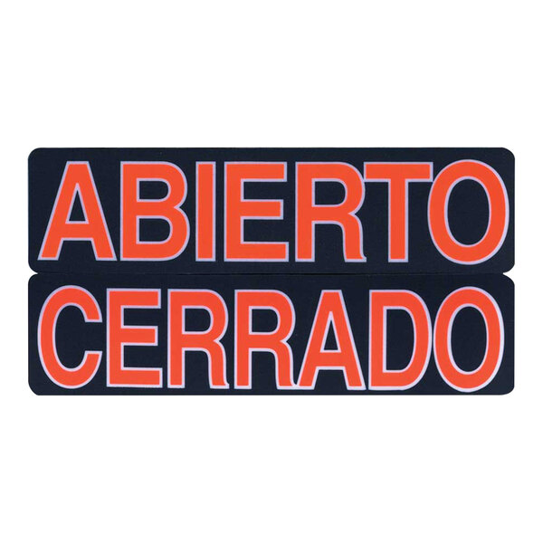 A black sign with white and orange text that reads "Abierto / Cerrado" in white and "Open / Closed" in orange.