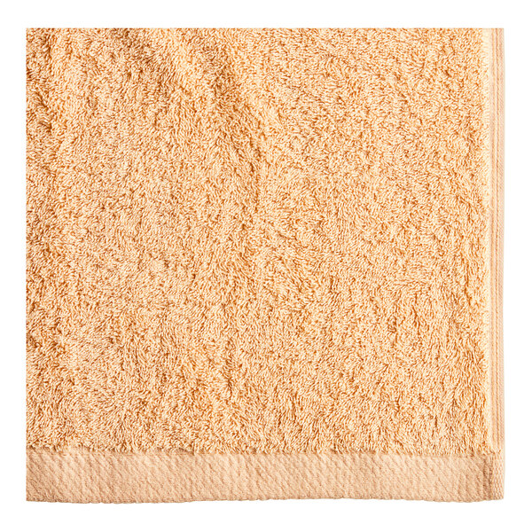 An Oxford 100% Ringspun Cotton pool towel in beige.