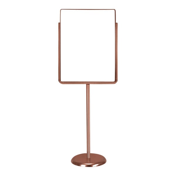 A rectangular bronze sign holder on a metal stand with a white background holding a white sign.