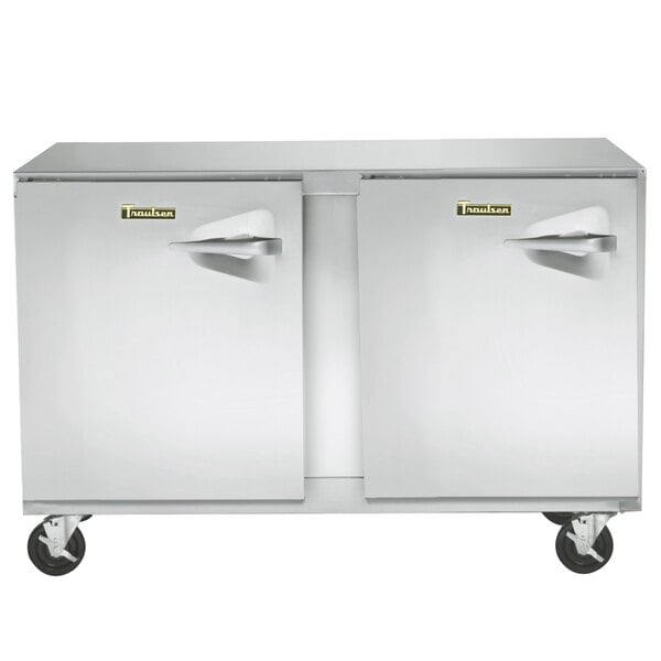 A Traulsen stainless steel undercounter freezer with two left hinged doors.