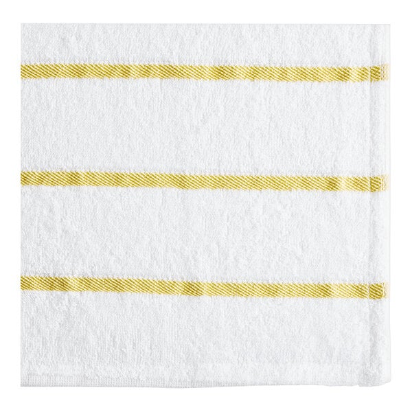 A white towel with yellow stripes.