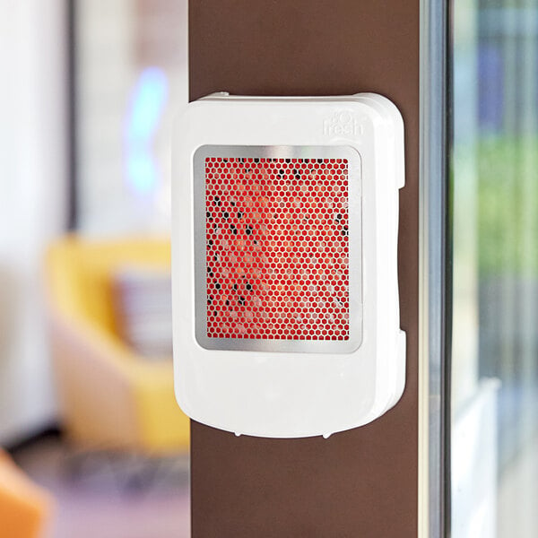 A white rectangular air freshener cabinet with a red and white thermostat.