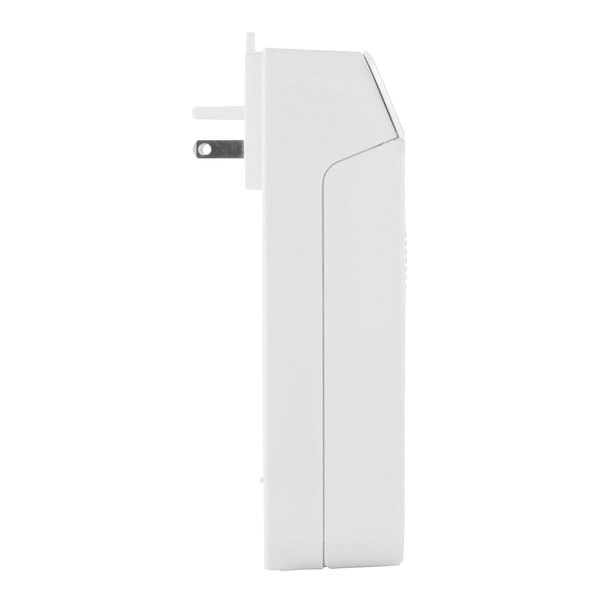 A white air freshener cabinet with a plug for wall outlet use.